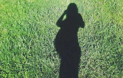 Shadow image of a pregnant woman ~ photo by Brandi Reed on Reshot